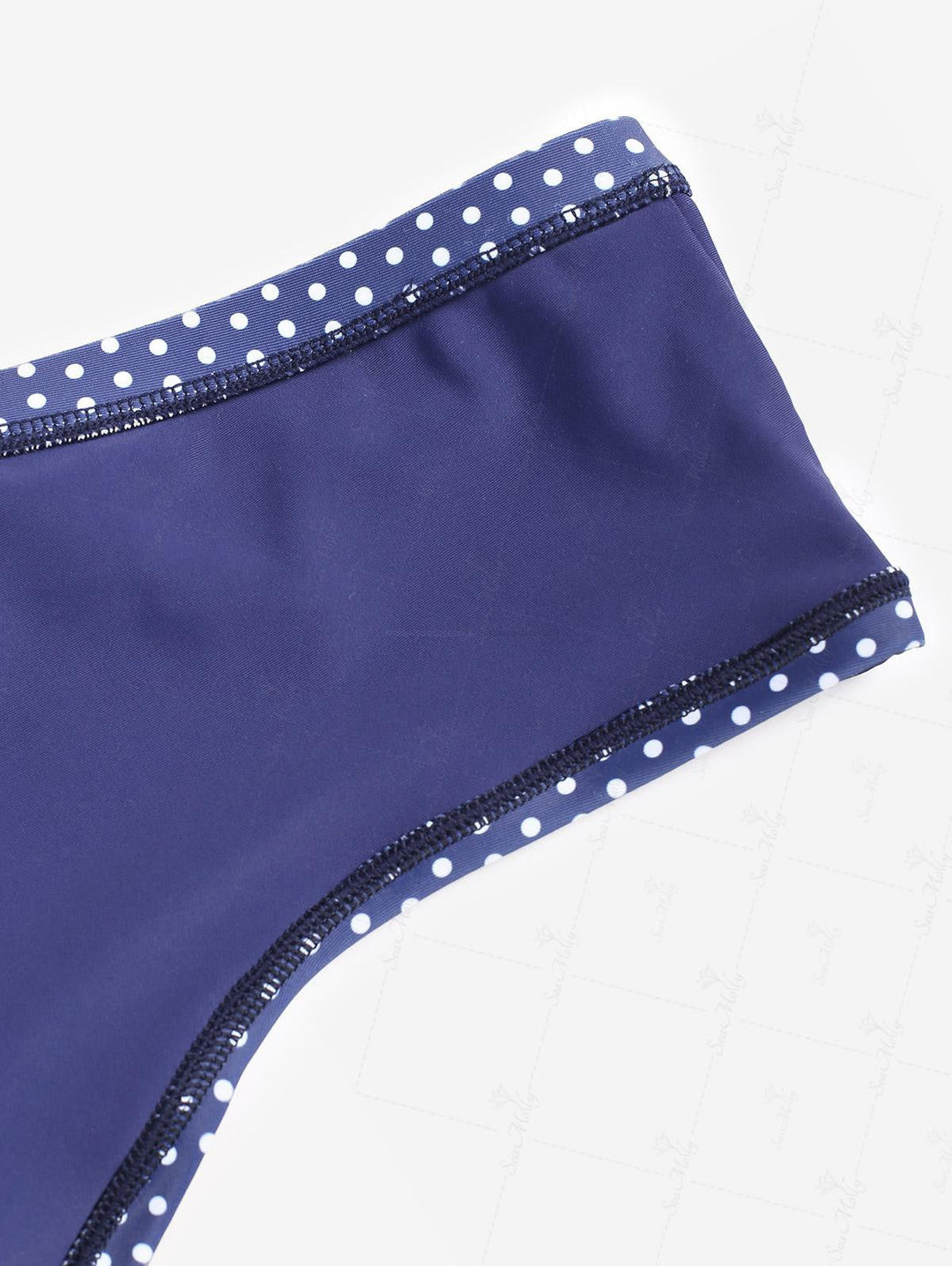 Carla | Bañador de playa con estampado de lunares y lazo