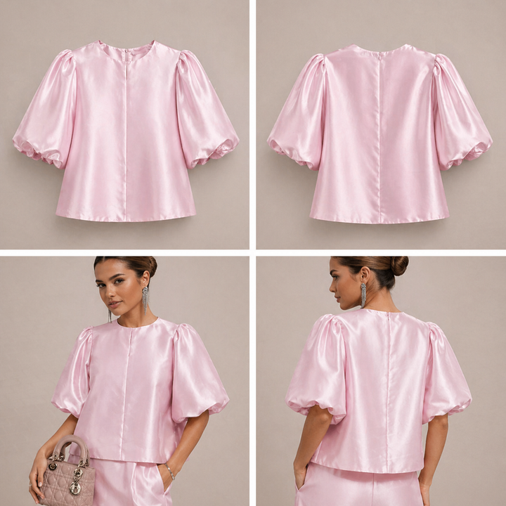 Elegante top de satén con mangas abullonadas